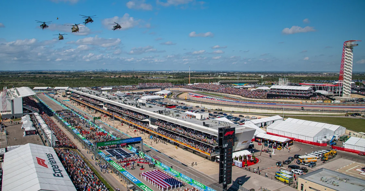 Helicopters flying above the pit lane at the US Grand Prix