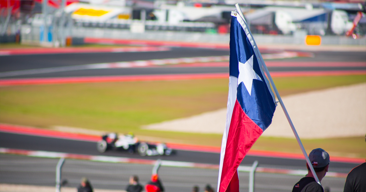 A Texan flag is waved at the US Grand Prix