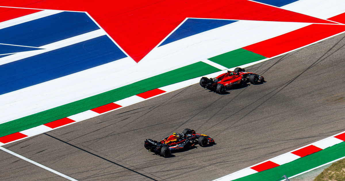 Ferrari and Red Bull F1 cars doing battle at the Circuit of the Americas