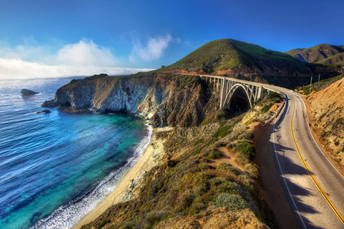 Explore the iconic Highway 1 in an exotic car on a self-guided driving holiday