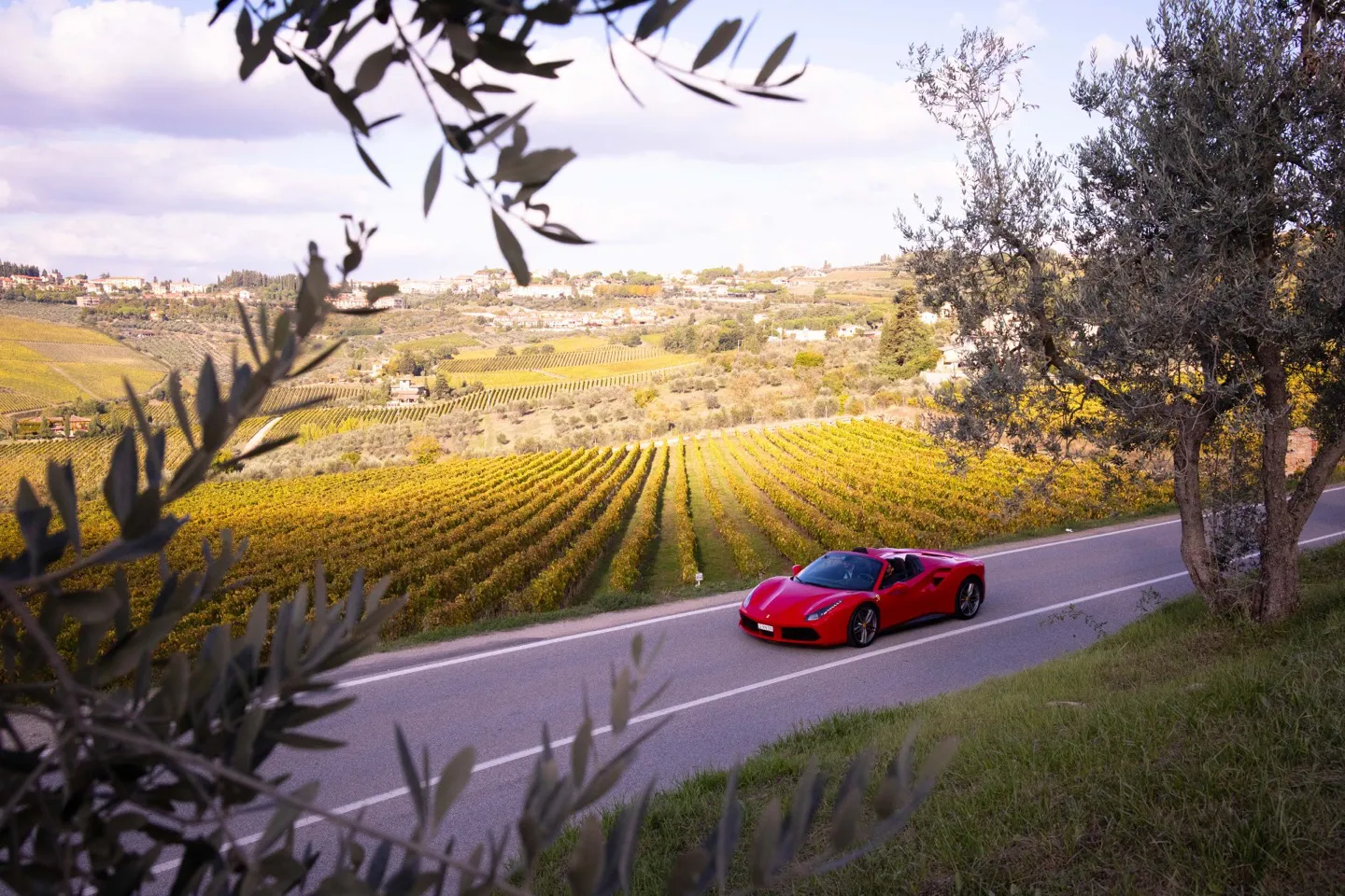 Enjoy gourmet food and wine throughout Tuscany on a luxury driving escape in a Ferrari